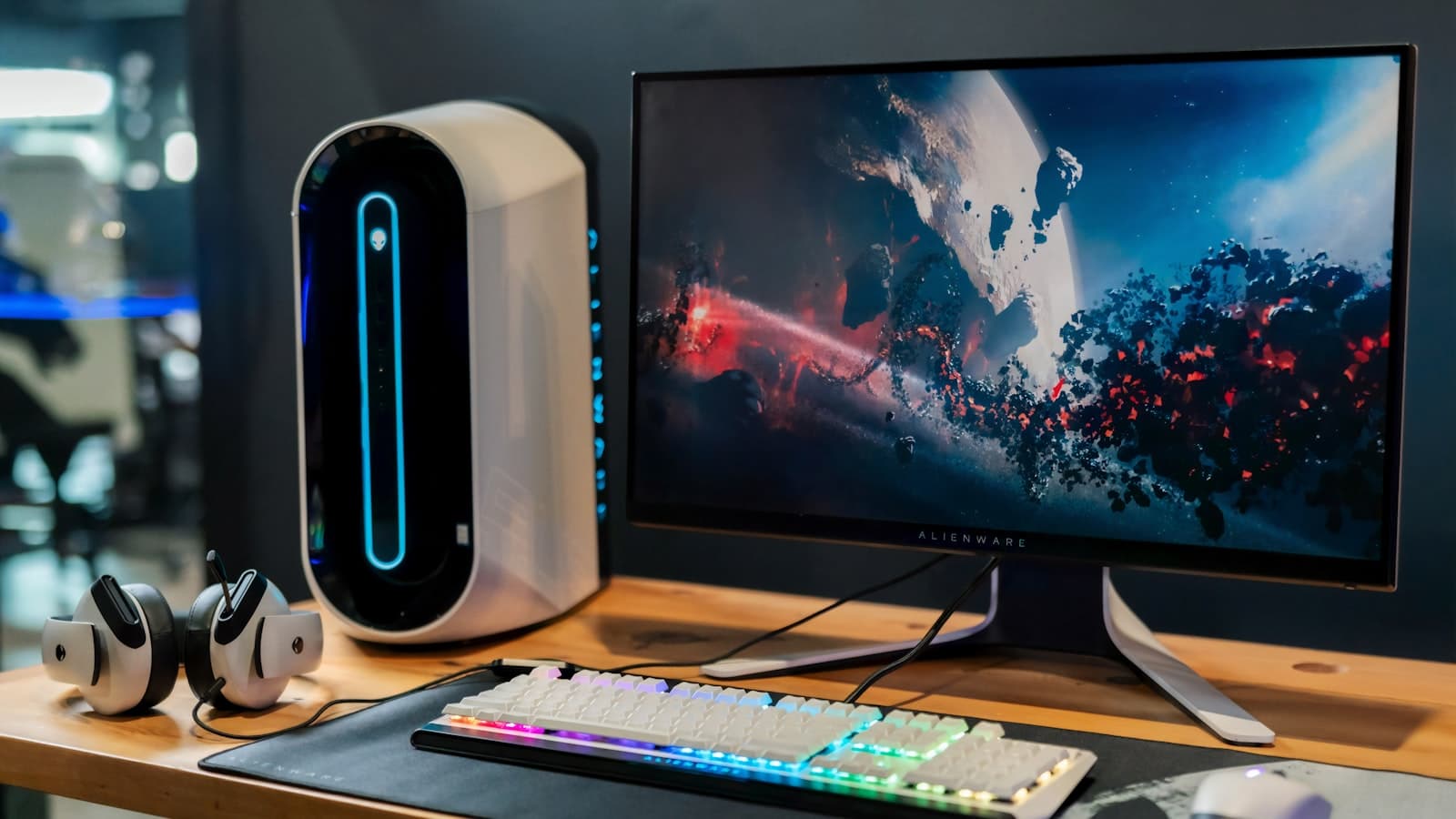 A Windows desktop PC, monitor, and backlit keyboard