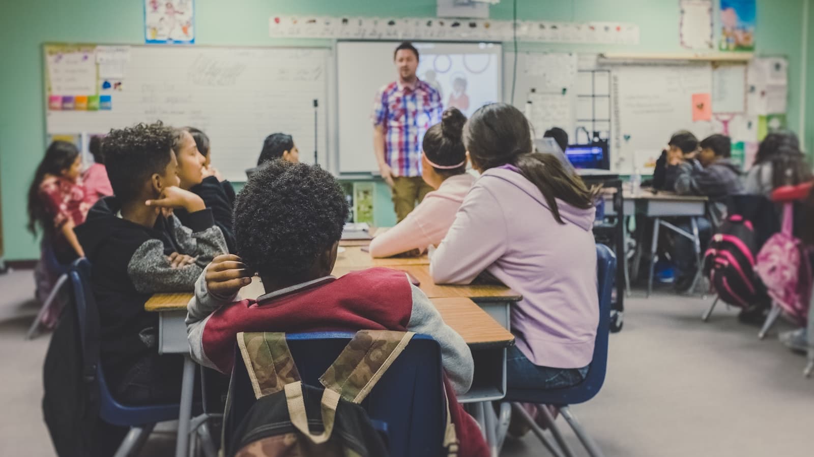 Students at desks in a classroom