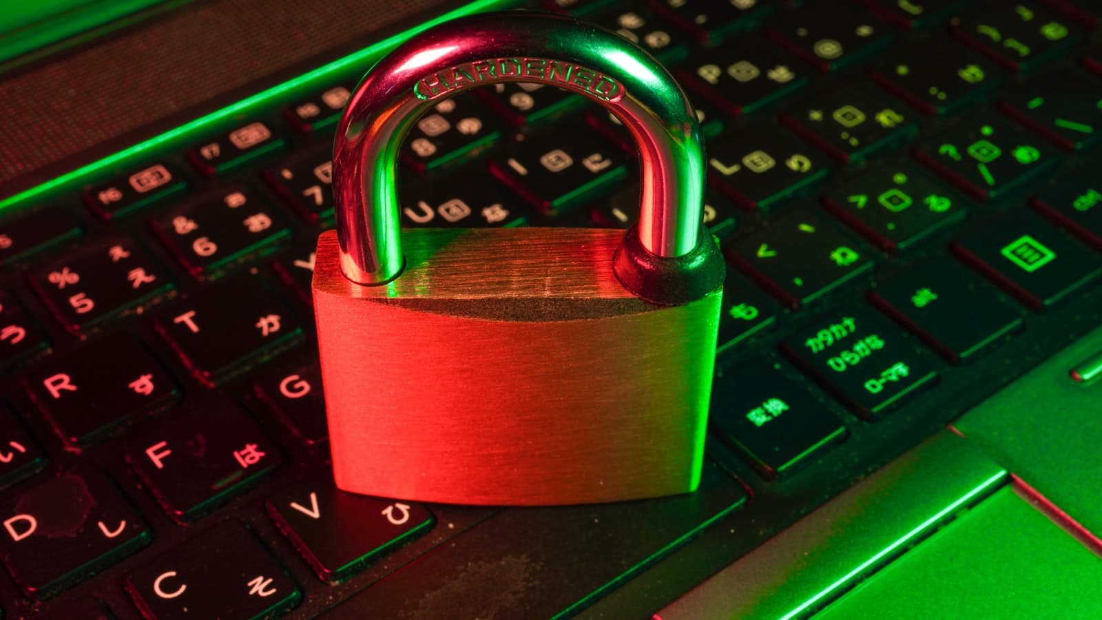 A padlock resting on a laptop keyboard