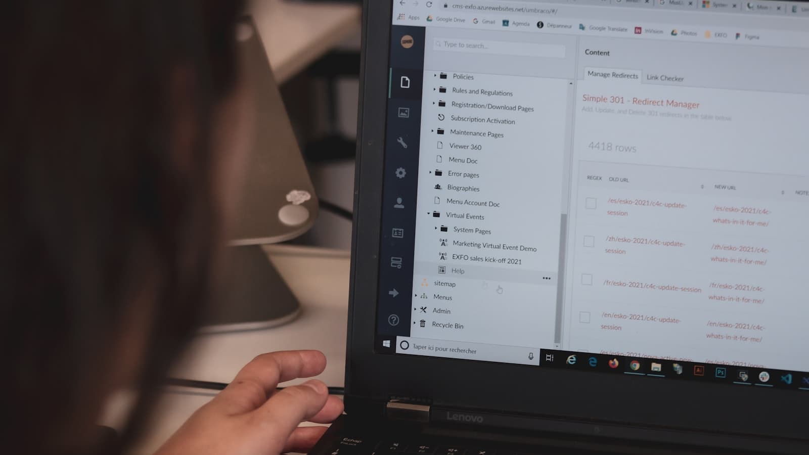 A Windows laptop with File Explorer on the taskbar